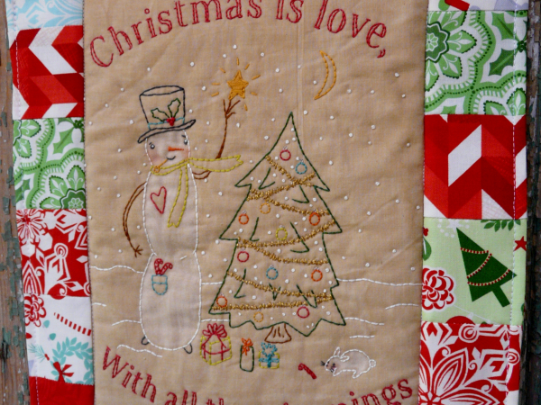 Snowman trimming tree embroidery quilt pattern