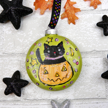 Halloween Kitty cat in pumpkin ornament - moons & stars on green - boo! saying