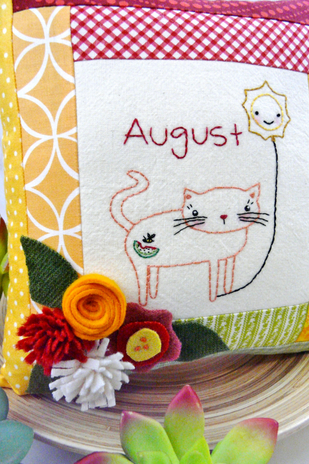 August Kitty Cat Embroidery pillow pattern #397 kitty cat holding the month of august hot balloon