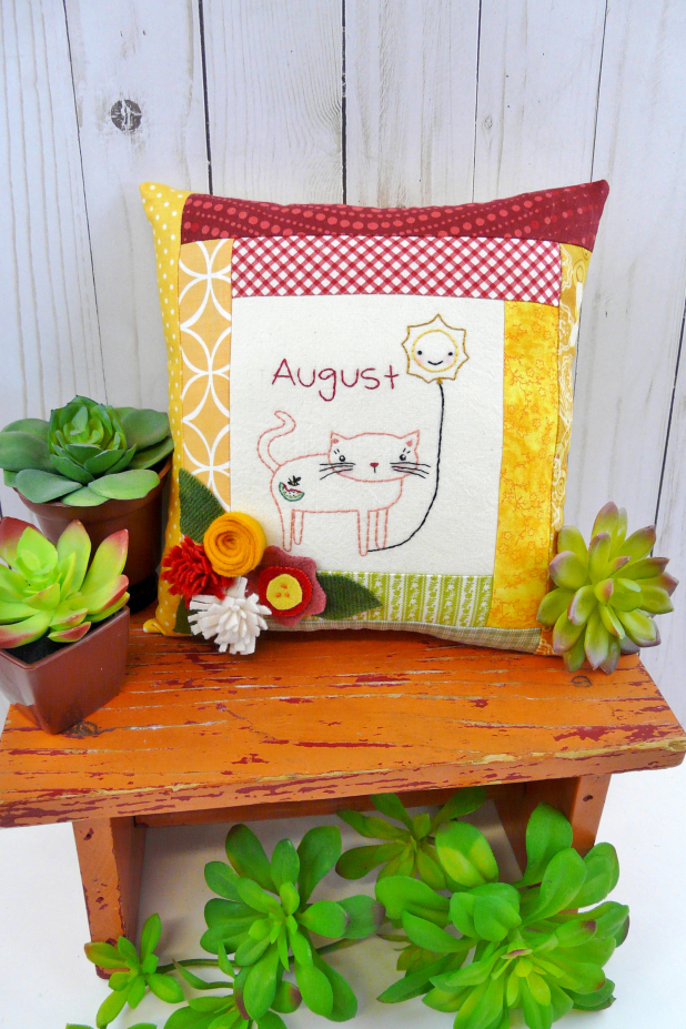 August Kitty Cat Embroidery pillow pattern #397 kitty cat holding the month of august hot balloon wool flowers