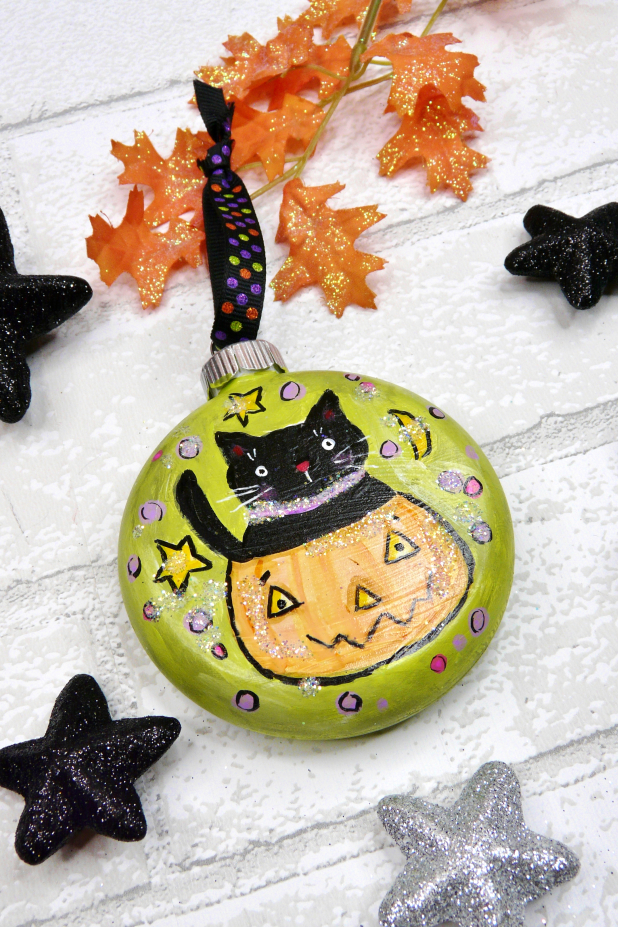 Halloween Kitty cat in pumpkin ornament - moons & stars on green - boo! saying black kitty cat
