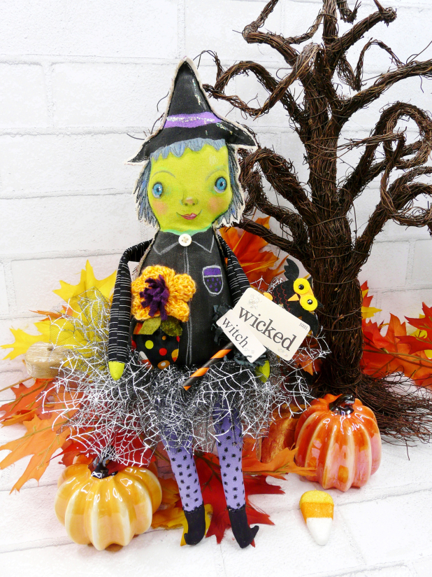 Green wicked witch doll - crocheted flower